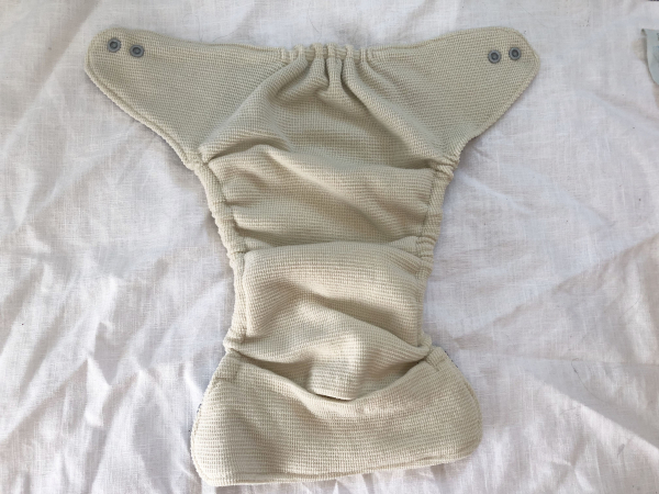 Kindsknopf Schneckenherz Wollüberhose